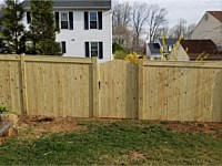 <b>Pressure Treated Privacy Fence with Fascia and arched walk gate</b>